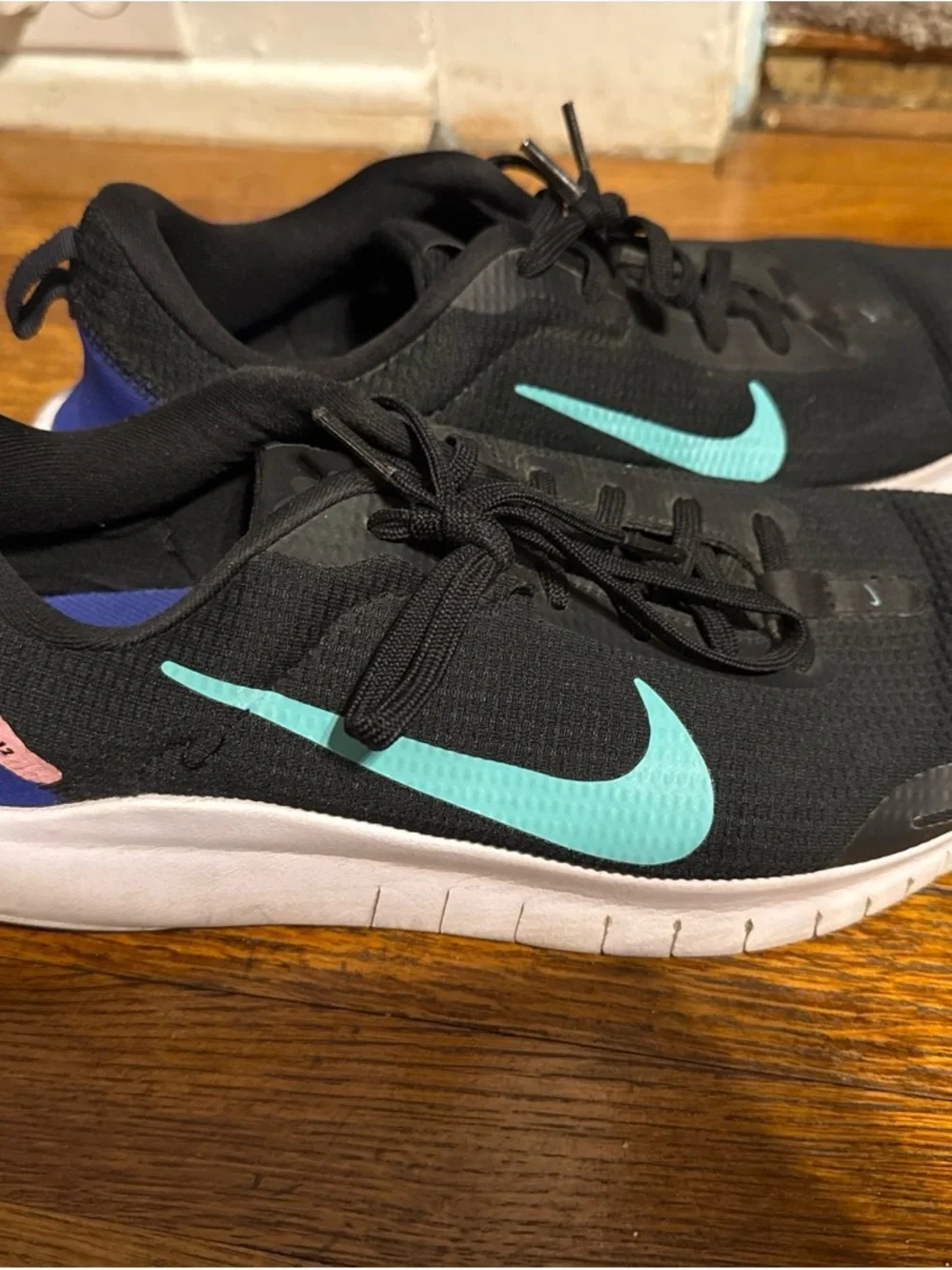 Nike Men’s Black Athletic Shoes with Teal Swoosh